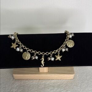 Gold Tone Charm Bracelet with Seahorse, Seashells and Pearls